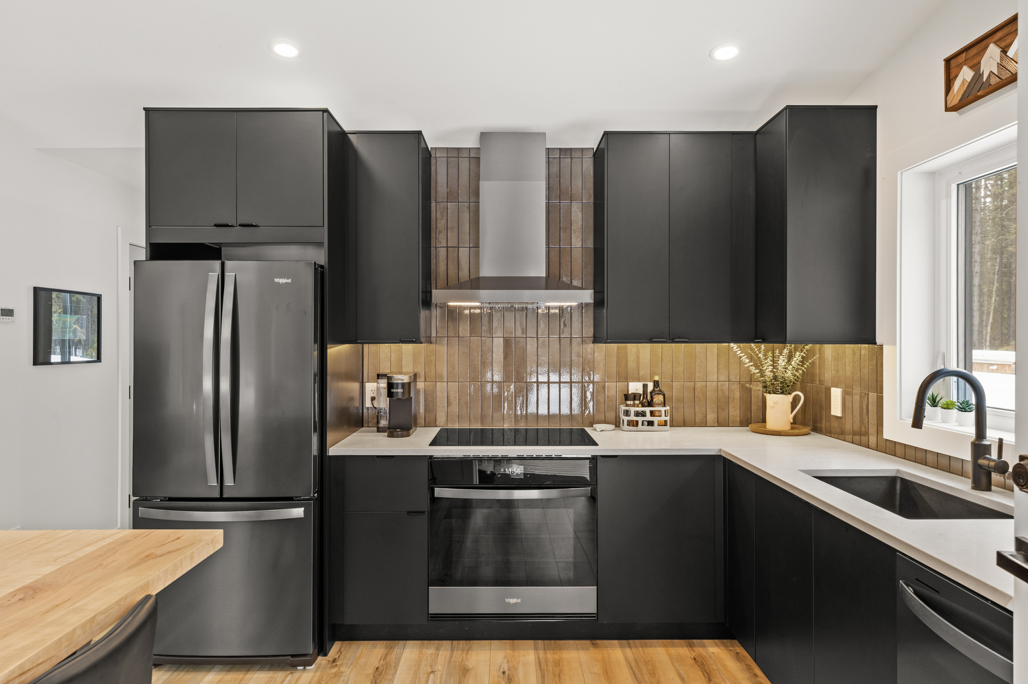 Stainless Range and Artisan Tile Backsplash