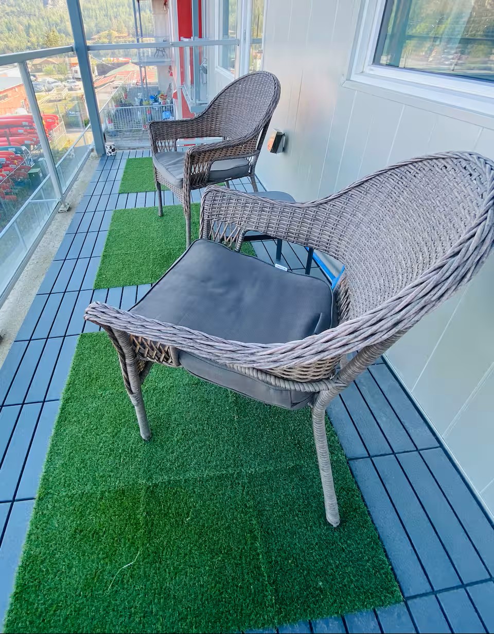 Private Balcony with Wicker Chairs